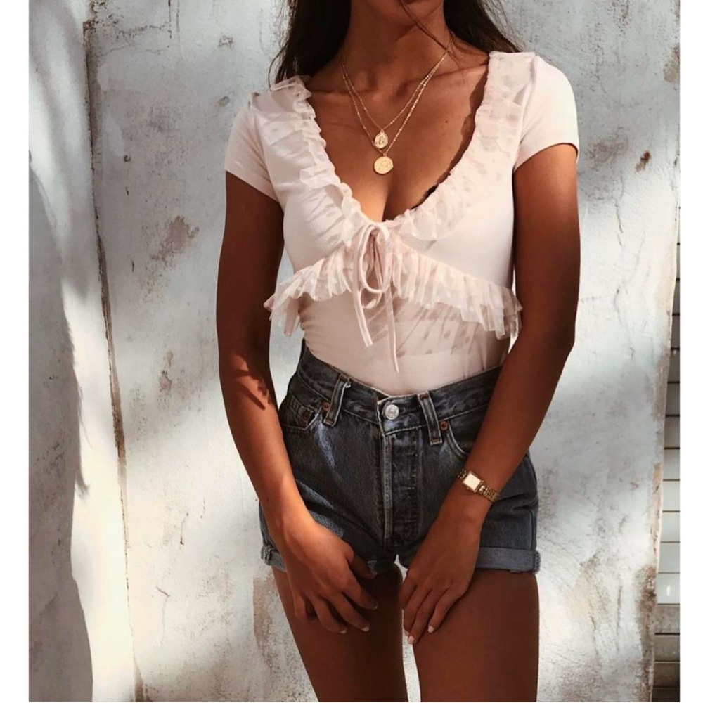 Elegant Cream Ruffle Top